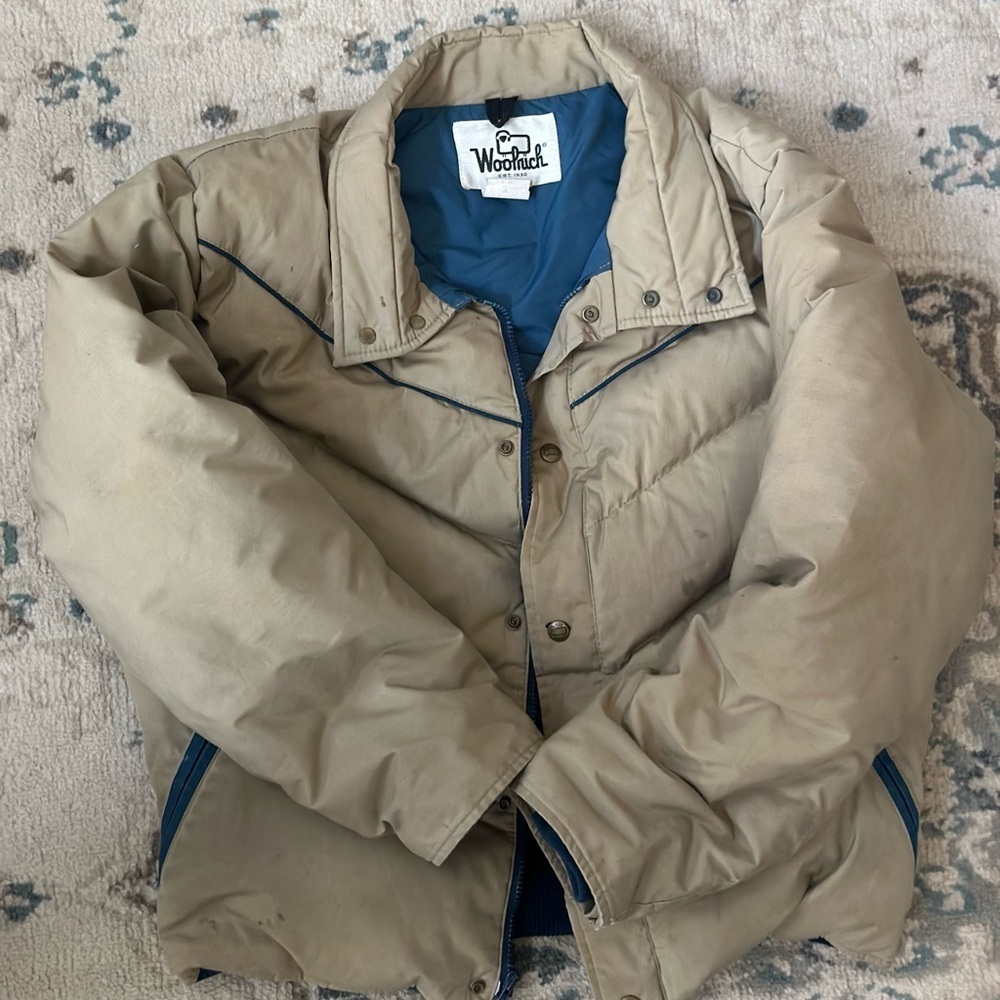 Cream and blue Woolrich puffer jacket 
Few stain marks